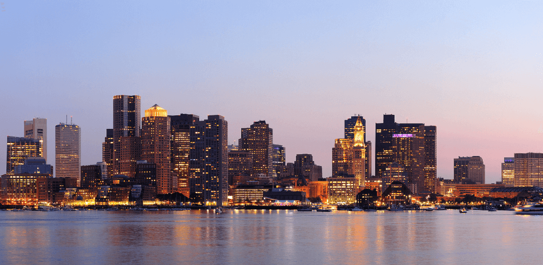 boston-ma-usa-skyline-at-dusk-with-water.png