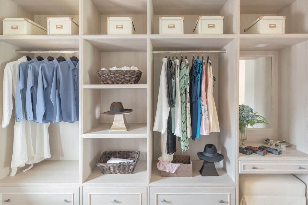 clothes-hanging-in-modern-large-closet.jpg