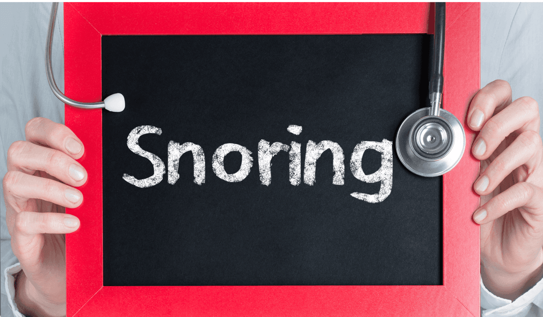 doctor-holding-snoring-written-in-chalk-on-blackboard.png