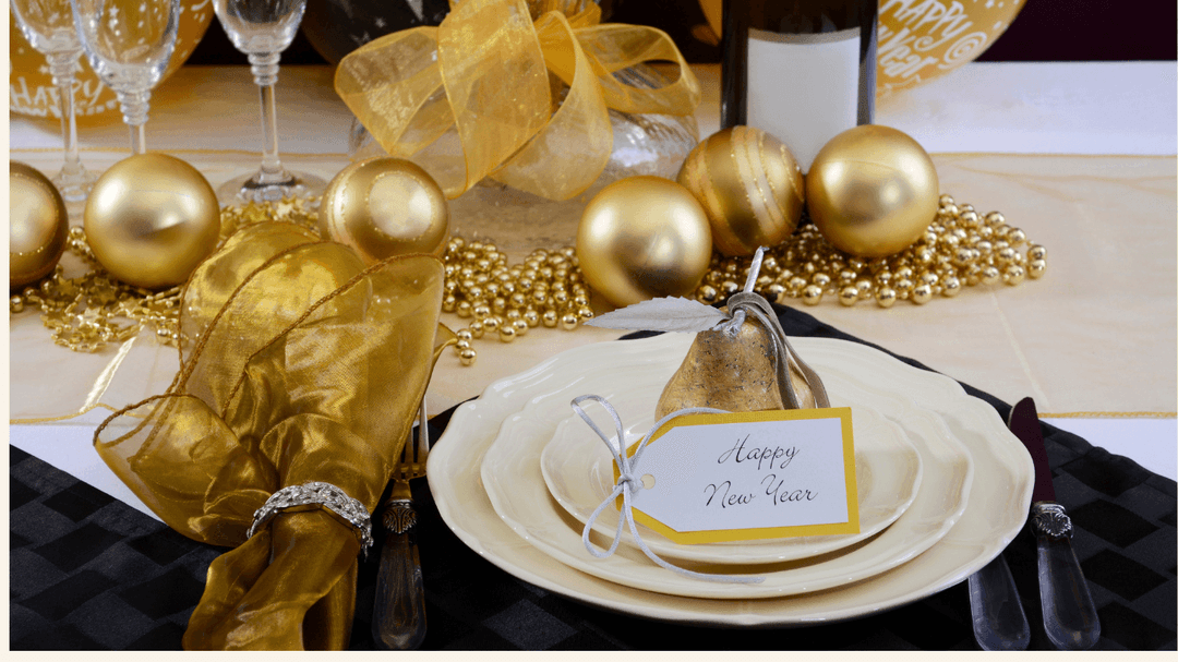 happy-new-year-on-plate-gold-decorations.png