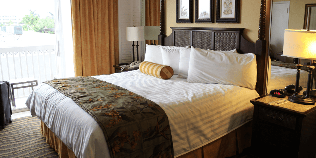 modern-flat-bedroom-with-balcony-windows.png