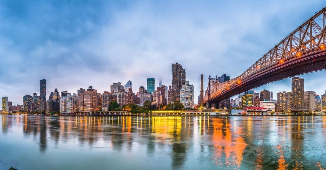 ny-bridge-across-water-at-dusk.jpg