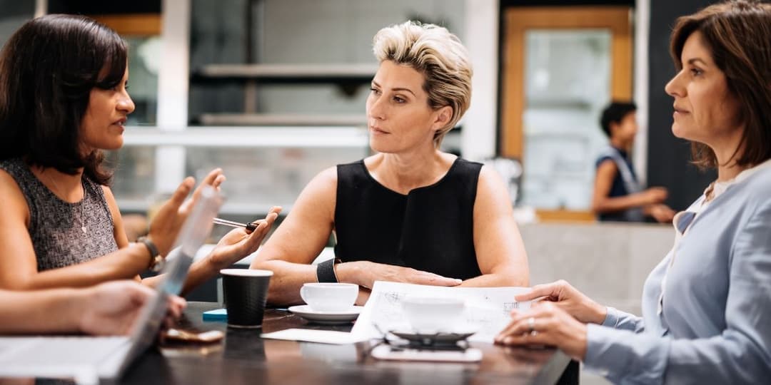 women-at-meeting-talking.jpg