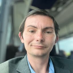 AARON COX